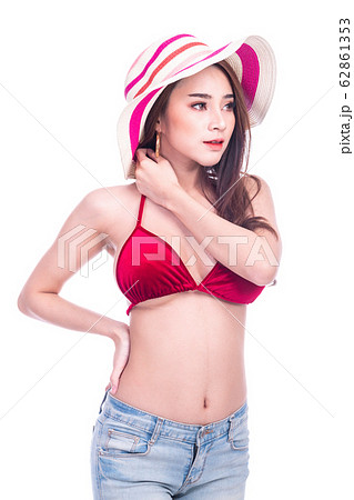 Cute asian woman in red bikini, summer hat and 62861353