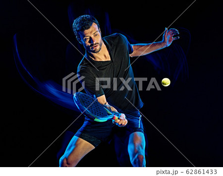 Paddle tennis player man light painting isolated black background Paddle tennis player man light painting isolated black background 62861433