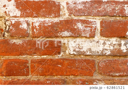 Brick wall made of old red brick. 62861521