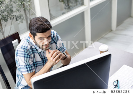 Freelancer working from home and using computer. 62862288