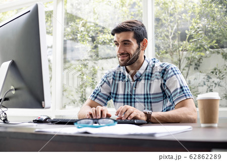 Freelancer working from home and using computer. 62862289