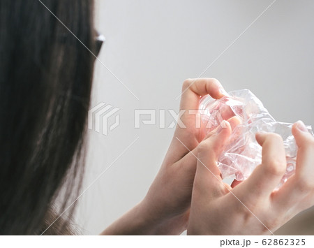 Squashing Plastic Bottle 62862325
