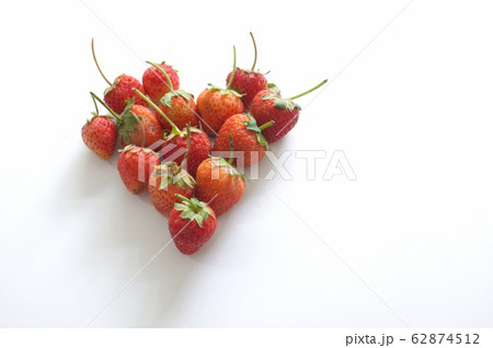Heart made from strawberry, isolated on white Heart made from strawberry, isolated on white 62874512