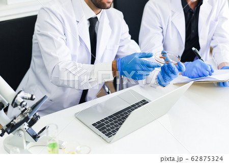 Team of scientist research are working in 62875324