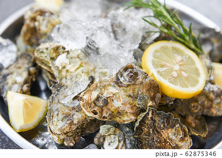 Oyster shell with herb spices lemon rosemary 62875346