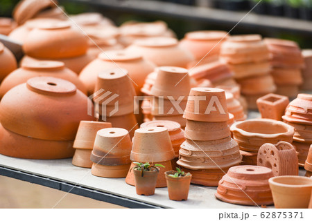 Clay flowerpot in the nursery plant tree - 62875371