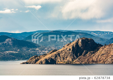 Scenery view of rocky slope over the lake in British Columbia. Scenery view of rocky slope over the lake in British Columbia. 62878738