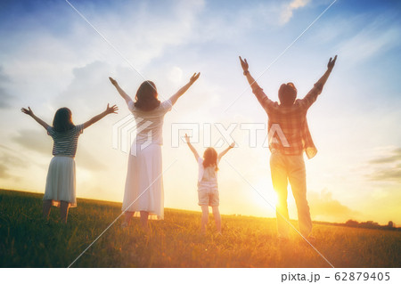 Happy family on summer walk Happy family on summer walk 62879405