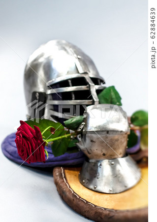 Knight's metal helmet isolated on white background. 62884639
