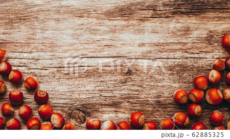 brown wooden background organic snacks hazelnut brown wooden background organic snacks hazelnut 62885325