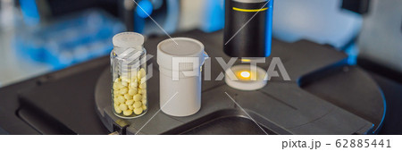 Science lab research safe of new drugs, microscope and pills coronavirus BANNER, LONG FORMAT Science lab research safe of new drugs, microscope and pills coronavirus BANNER, LONG FORMAT 62885441