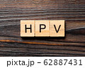 HPV word written on wood block. HPV text on wooden 62887431