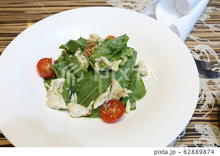 Italian Crab Salad with tomato on white plate Italian Crab Salad with tomato on white plate 62889874
