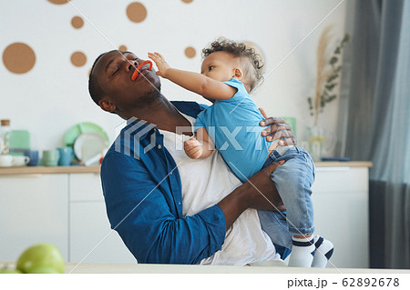 Little Boy Playing with father Little Boy Playing with father 62892678
