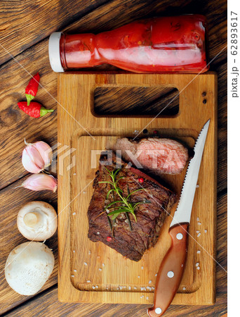 Overhead view of a portion of juicy grilled beef Overhead view of a portion of juicy grilled beef 62893617