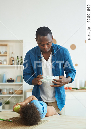 Dad Changing Diaper 62894649