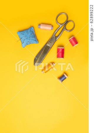 Multi colored threads pink reels, measuring tape, 62899222