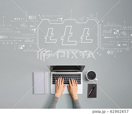 Litecoin with person using laptop Litecoin with person using laptop 62902657