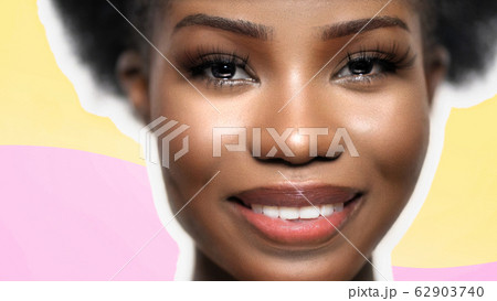 Pretty Afro Woman laughs happily, Face Close Up Pretty Afro Woman laughs happily, Face Close Up 62903740