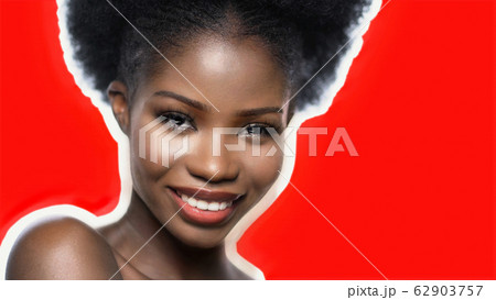 Smiling Dark-Skinned Woman With Naked Shoulders Smiling Dark-Skinned Woman With Naked Shoulders 62903757