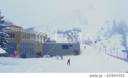 Wonderful snowy winter landscape in the Alps - aerial view 62904363
