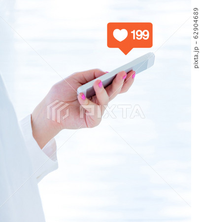 phone in female hand 62904689