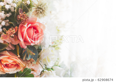 Artificial flowers decoration background in vintage classic tone color Artificial flowers decoration background in vintage classic tone color 62908674