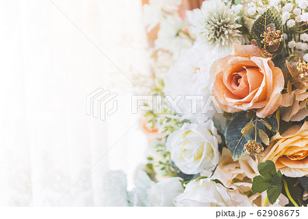 Artificial flowers decoration background in vintage classic tone color 62908675