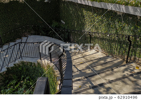 Contemporary style of stairs way down to front Contemporary style of stairs way down to front 62910496