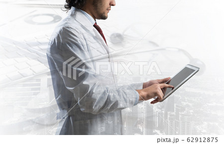 Medical industry concept by means of successful doctor Medical industry concept by means of successful doctor 62912875
