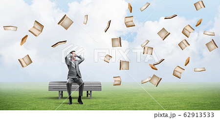 Young man in suit in park dont want to hear anything Young man in suit in park dont want to hear anything 62913533