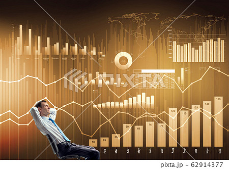 Relaxed businessman in chair Relaxed businessman in chair 62914377