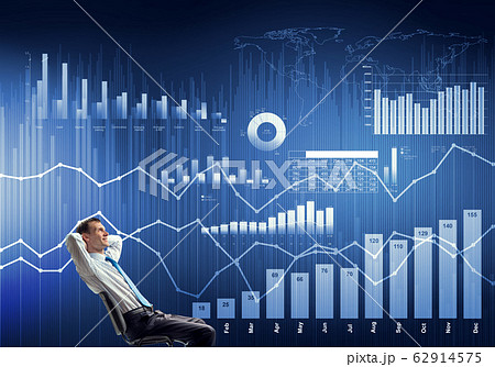 Relaxed businessman in chair Relaxed businessman in chair 62914575