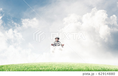 Young boy keeping mind conscious. Young boy keeping mind conscious. 62914880
