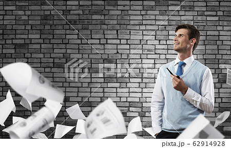 Conceptual image of young businessman. Conceptual image of young businessman. 62914928
