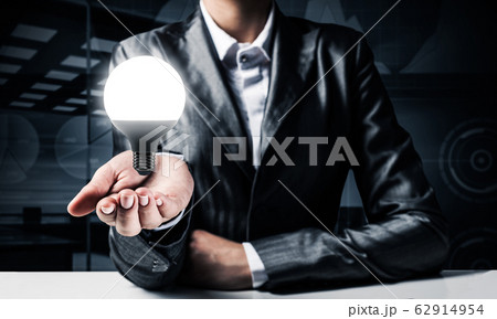 Concept of lightbulb as symbol of new idea. Concept of lightbulb as symbol of new idea. 62914954