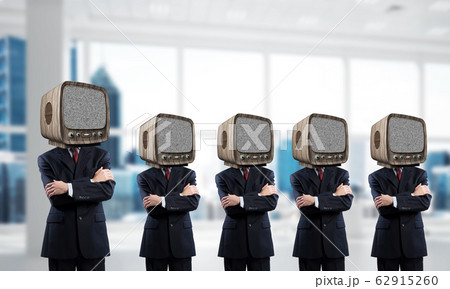 Businessmen with old TV instead of head. Businessmen with old TV instead of head. 62915260