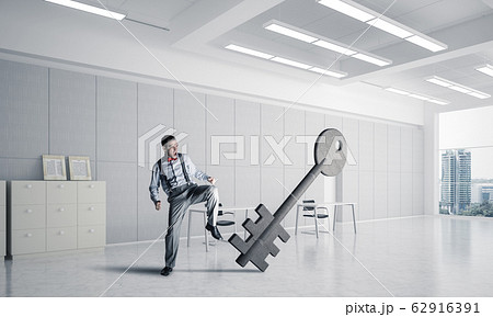 Breaking through access concept with furious man crashing concre Breaking through access concept with furious man crashing concre 62916391