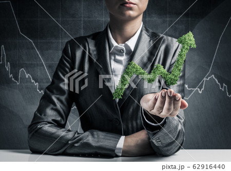 Businessman presenting growing graph. Businessman presenting growing graph. 62916440