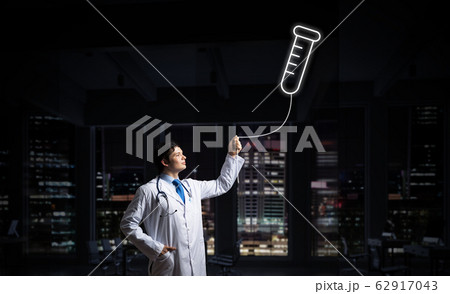 Doctor and medical vial symbol 62917043