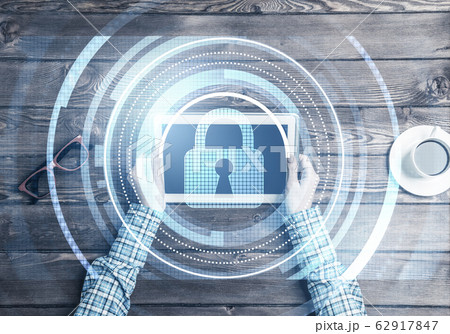 Concept of computer access with media lock icon on tablet screen 62917847