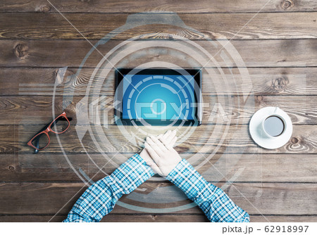 Business workplace with tablet device coffee cup and media interface Business workplace with tablet device coffee cup and media interface 62918997