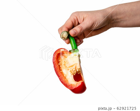 Woman holding red, sweet pepper or paprika Woman holding red, sweet pepper or paprika 62921725