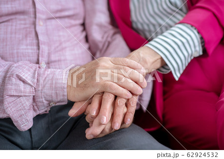 Close up picture of human hands holding eah other Close up picture of human hands holding eah other 62924532