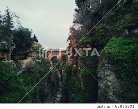 View of rocky canyons and New Bridge of Ronda 62925901