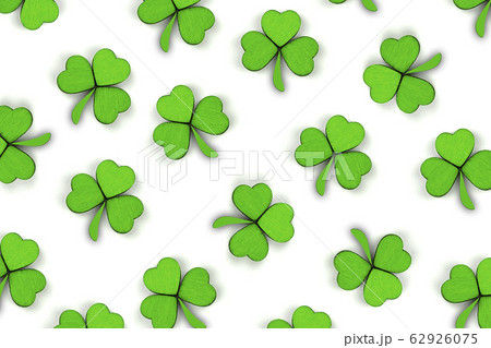 Pattern of green clovers or shamrocks background. St. Patrick's Day concept. Pattern of green clovers or shamrocks background. St. Patrick's Day concept. 62926075