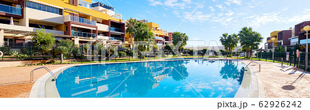 Exterior of modern apartments with swimming pool Exterior of modern apartments with swimming pool 62926242