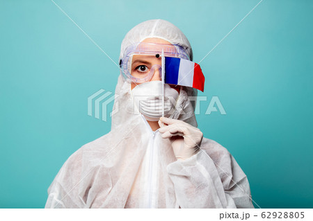 medic woman wearing protective clothing against medic woman wearing protective clothing against 62928805