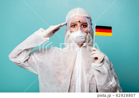 medic woman wearing protective clothing against 62928807