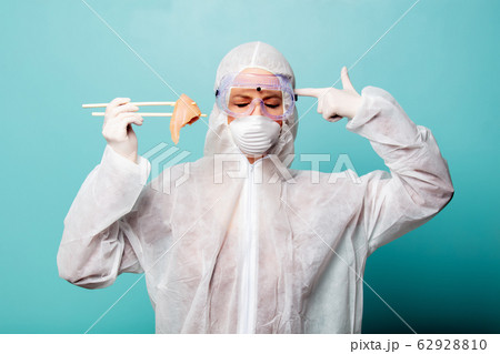 medic woman wearing protective clothing against 62928810